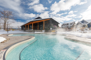 outdoor pool in winter of blue mountain homes for sale at Windfall